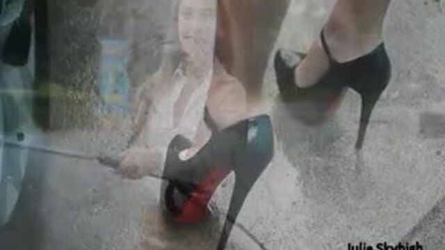 Sexy carwash in secretary outfit & wet high heels &