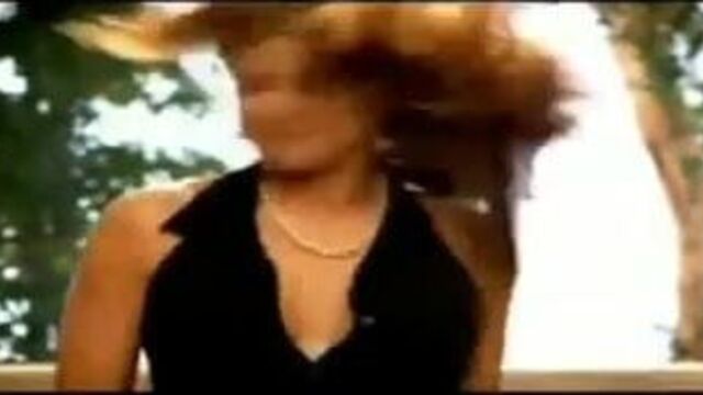 Carmen Electra strip aerobics black dress