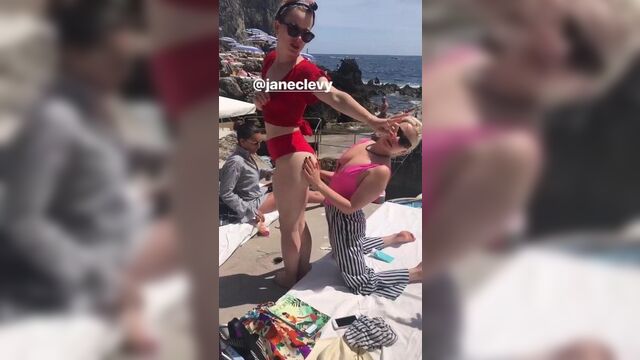 Mae Whitman rubbing Jane Levy's butt