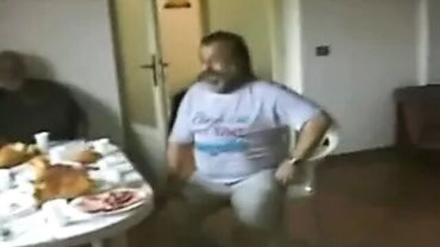 She sucks an old man while his friends watch