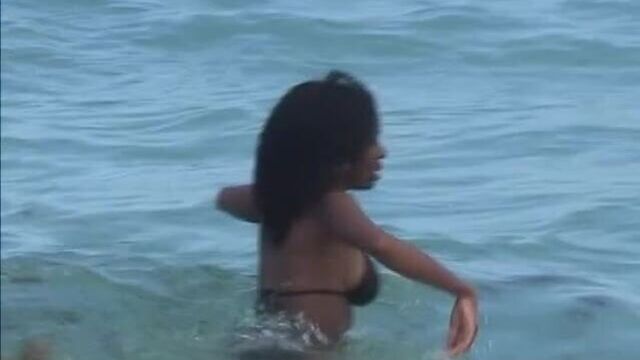 Black girls in swimsuits partying, swimming, and showing off their bodies